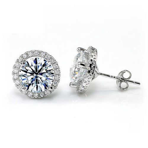top angle view aria silver round cut halo stud earrings by revert