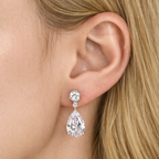 woman wearing ciela silver pear cut drop earrings by revert