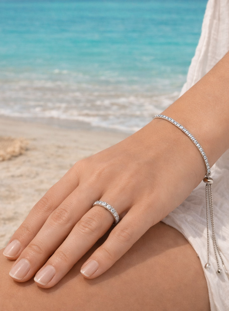 woman wearing eternity ring and tennis bracelet by Revert Jewellery